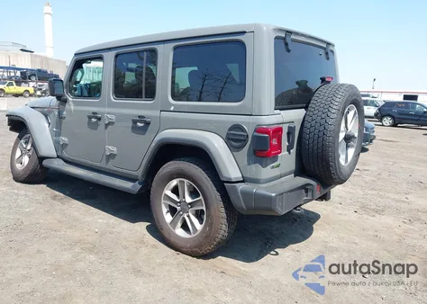 2022 Jeep Wrangler Unlimited Sahara 4X4 z USA, uszkodzony, nr VIN 1C4HJXEM7NW206585